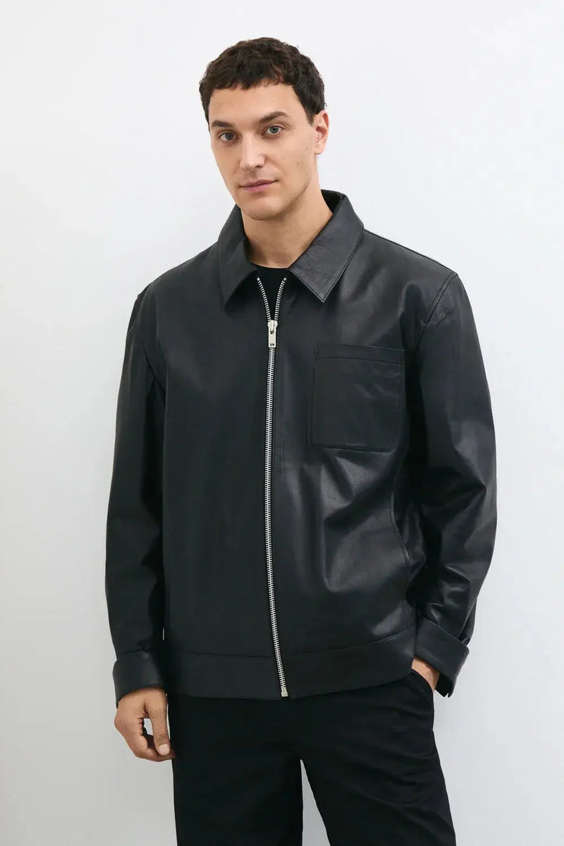 Men's black leather jacket made from premium full grain leather with front zipper closure, classic collar, and modern minimalist design by LEATHERTEXEU.