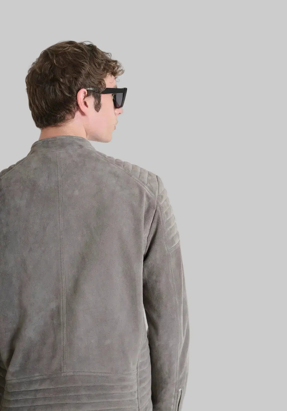 Men's slim fit suede jacket in stone grey featuring premium suede leather, biker-inspired detailing, zip-front closure and modern tailored fit.