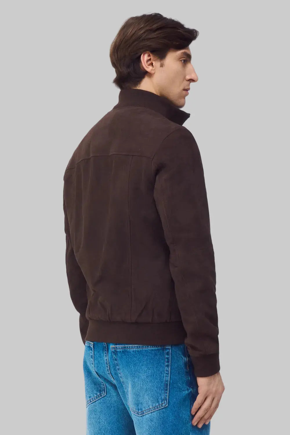 back side pose Men wearing Signature Espresso Suede leather jacket in rich brown suede finish with zip-front design, premium craftsmanship and modern casual style
