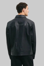 BACK POSE Men's black leather jacket made from premium full grain leather with front zipper closure, classic collar, and modern minimalist design by LEATHERTEXEU.
